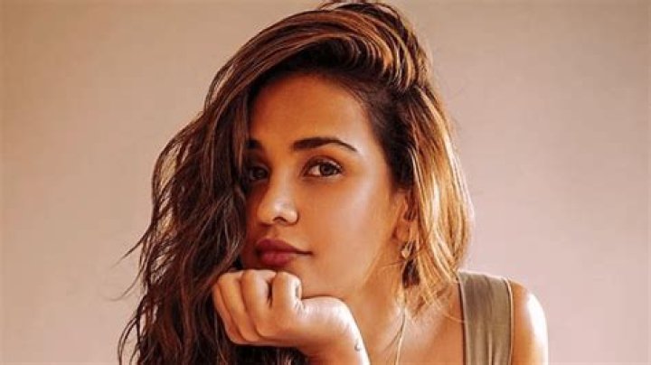 Aisha Sharma in Bathing Suit is "Tanning" — Celebwell